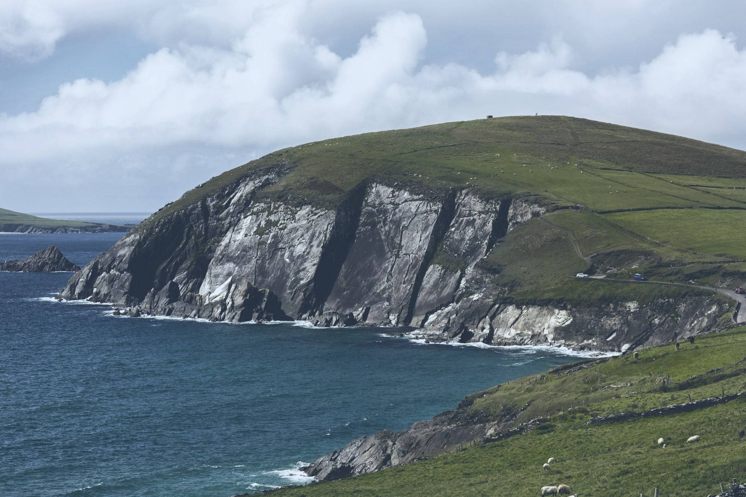A green headland and sea cliffs on the Wild Atlantic Way